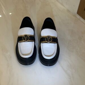 Louis Vuitton Monochrome Loafers with Gold Detail